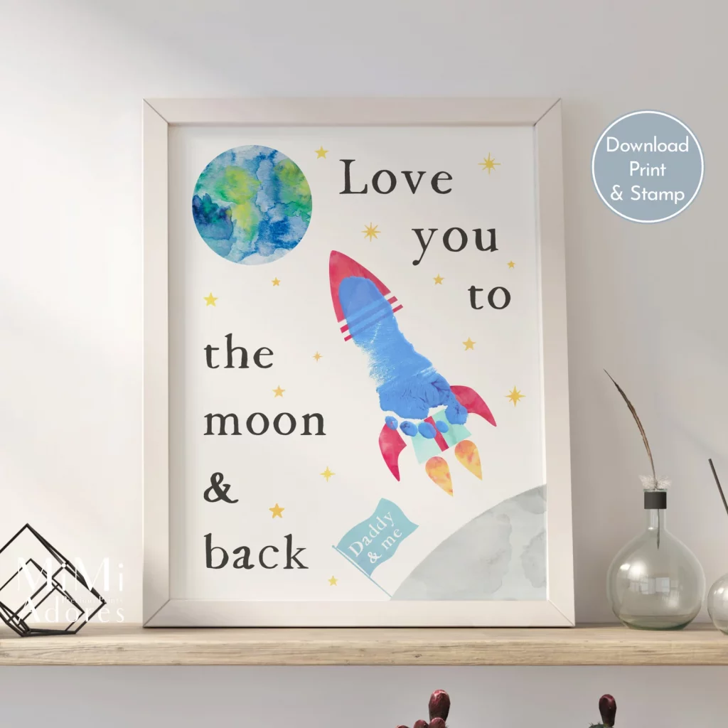 Framed footprint rocket printable displayed as nursery wall art
